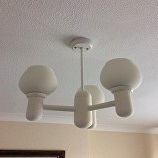 Painted wooden light fitting found in Bexley, Kent 